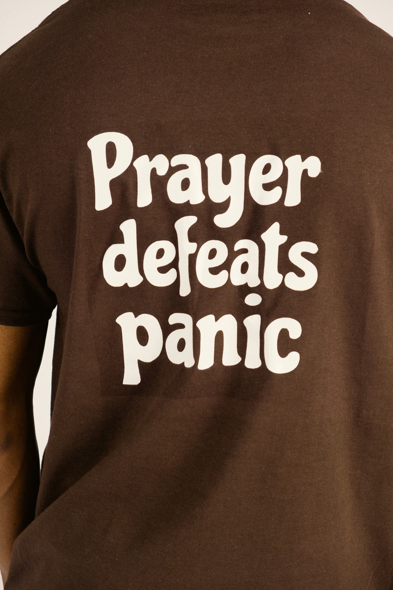 PRAYER DEFEATS PANIC TEE | CHOCOLATE / WHITE