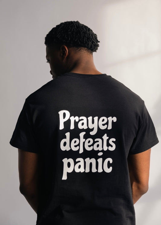 PRAYER DEFEATS PANIC TEE | BLACK / WHITE